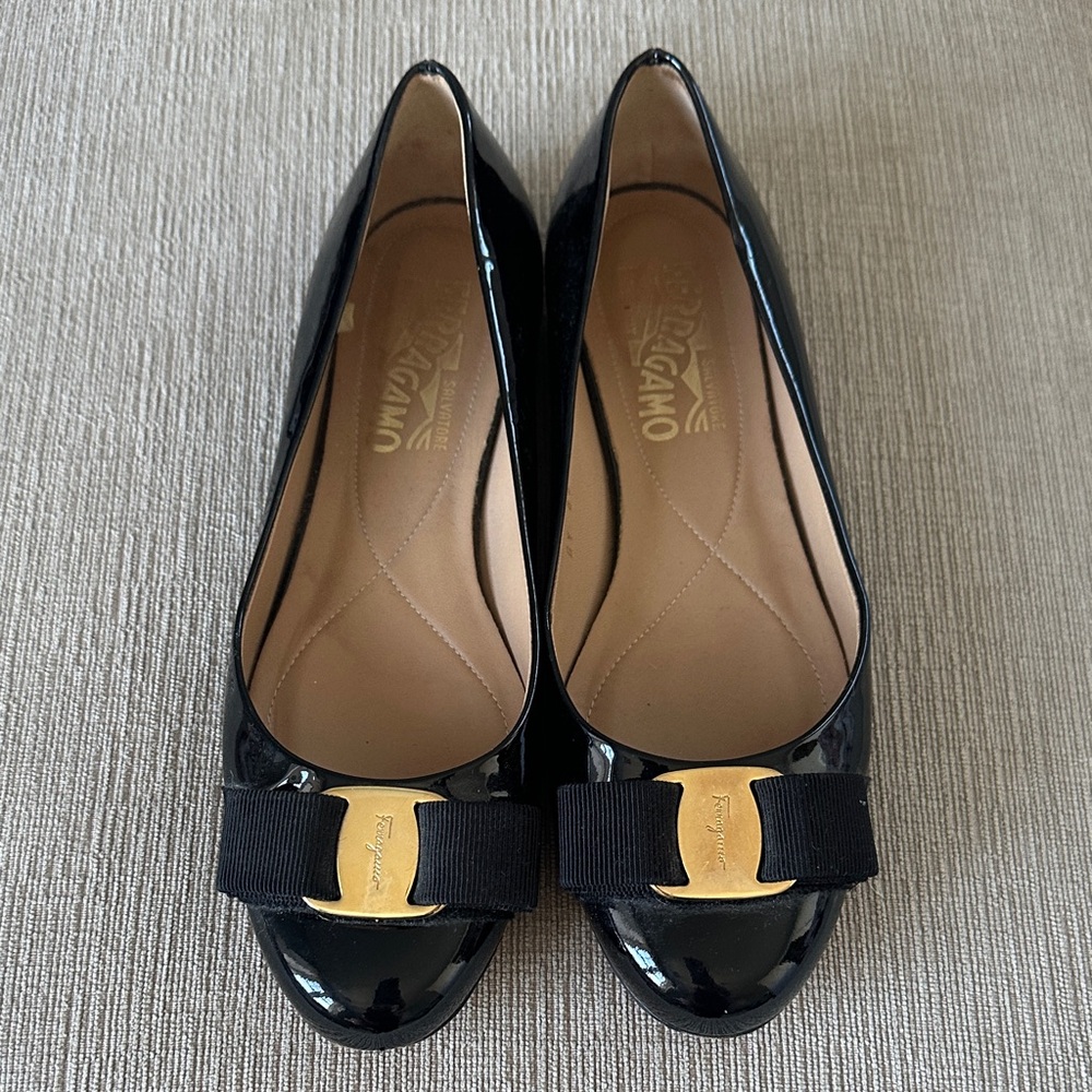 Salvatore Ferragamo Black Patent Leather Vara Bow Flats with Gold Logo Plaque